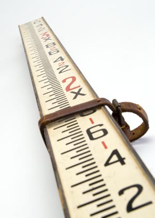 A length of timber marked with graduations