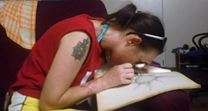 Shelley drawing using a magnifying glass. Shelley drawing using a magnifying glass.
