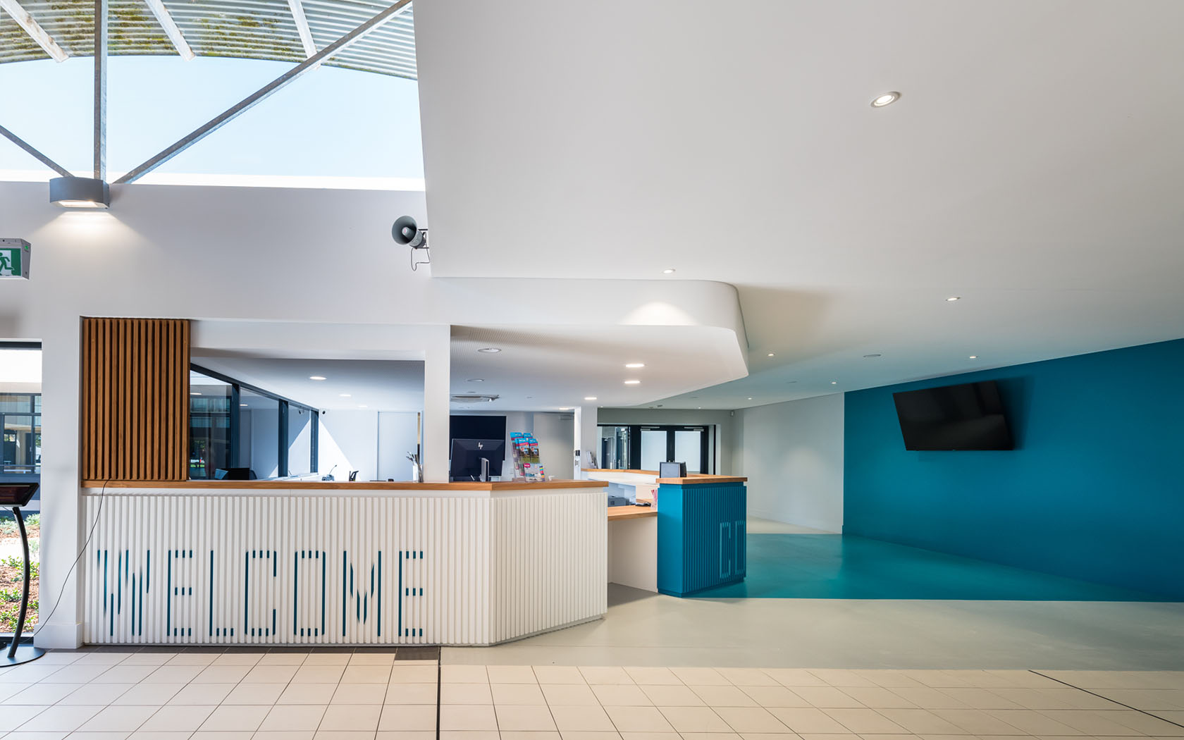 Interior view of the reception with a desk.