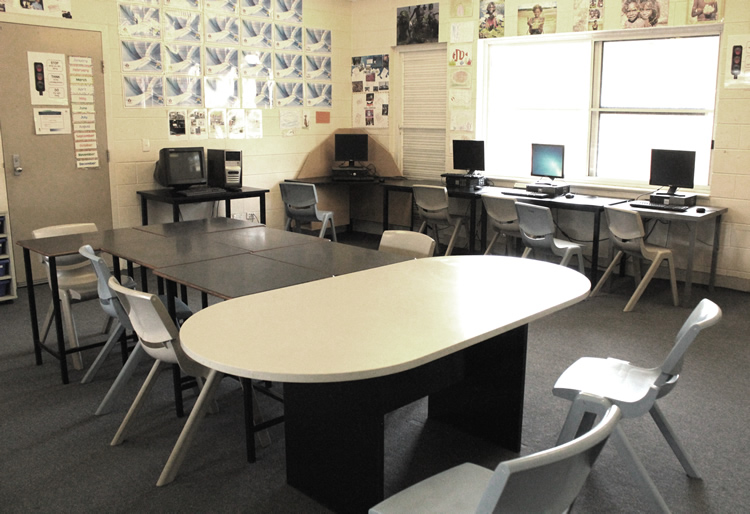 Classrooms look like those of any school