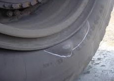 A tyre with a bulge in the tyre wall