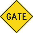 yellow diamond-shaped sign with black text, gate