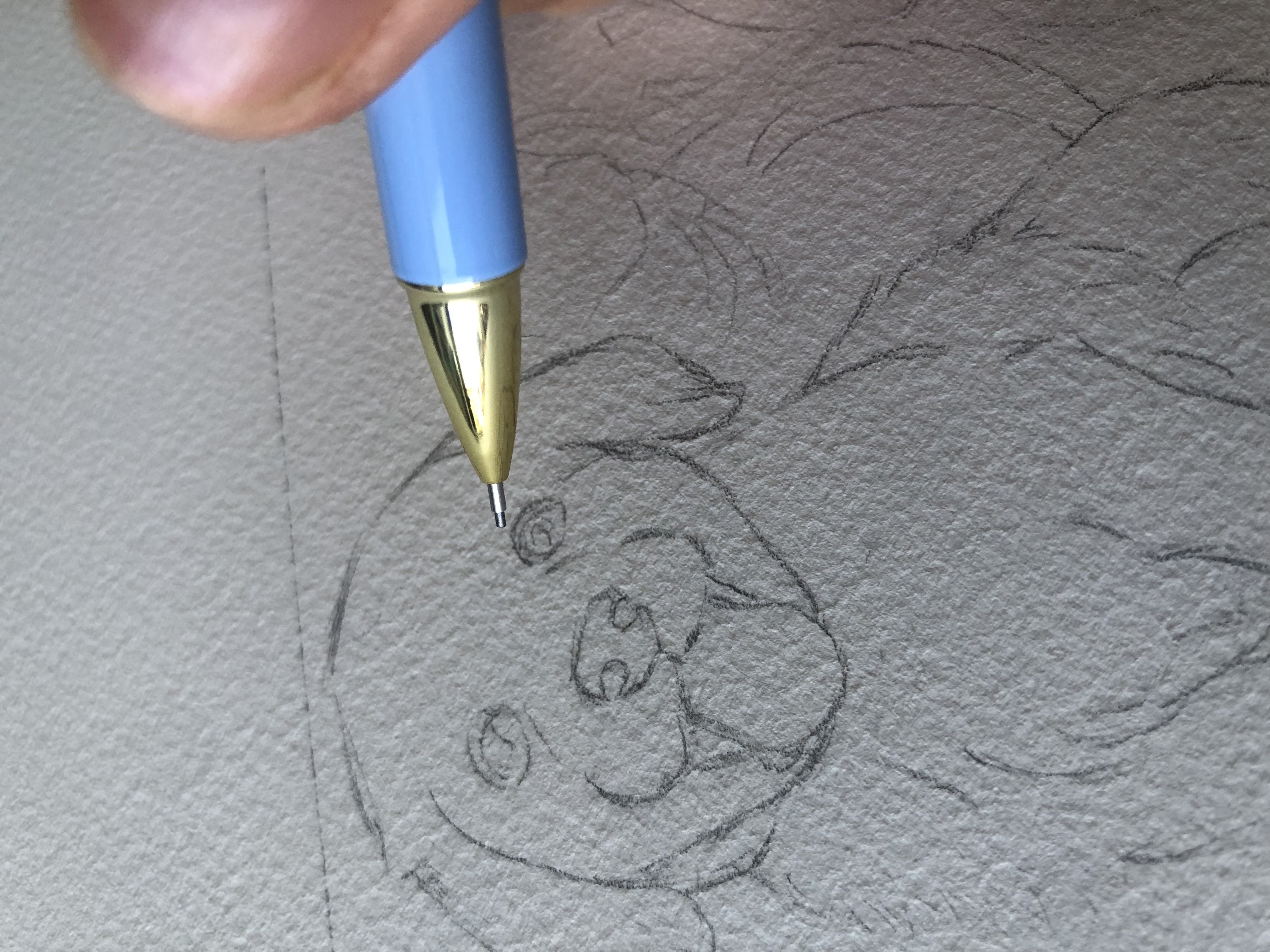 Dog sketch Artist Silka Huang sketching the Year of the Dog in pencil