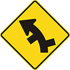 yellow diamond-shaped sign with black arrow that curves steadily left with alternate lines branching off on both sides of the curve