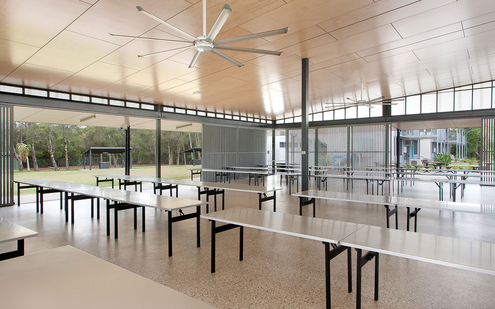 Interior of the dining hall with tables and chairs at the Sunshine Coast Recreation Precinct.
