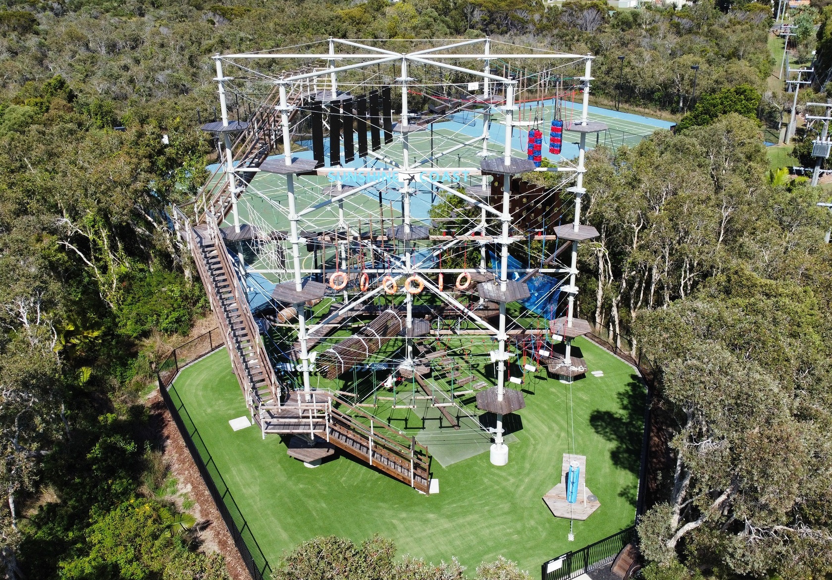 An aerial view of the outside adventure course with ropes