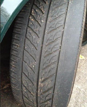 Tyre with outside edge worn beyond safe limits