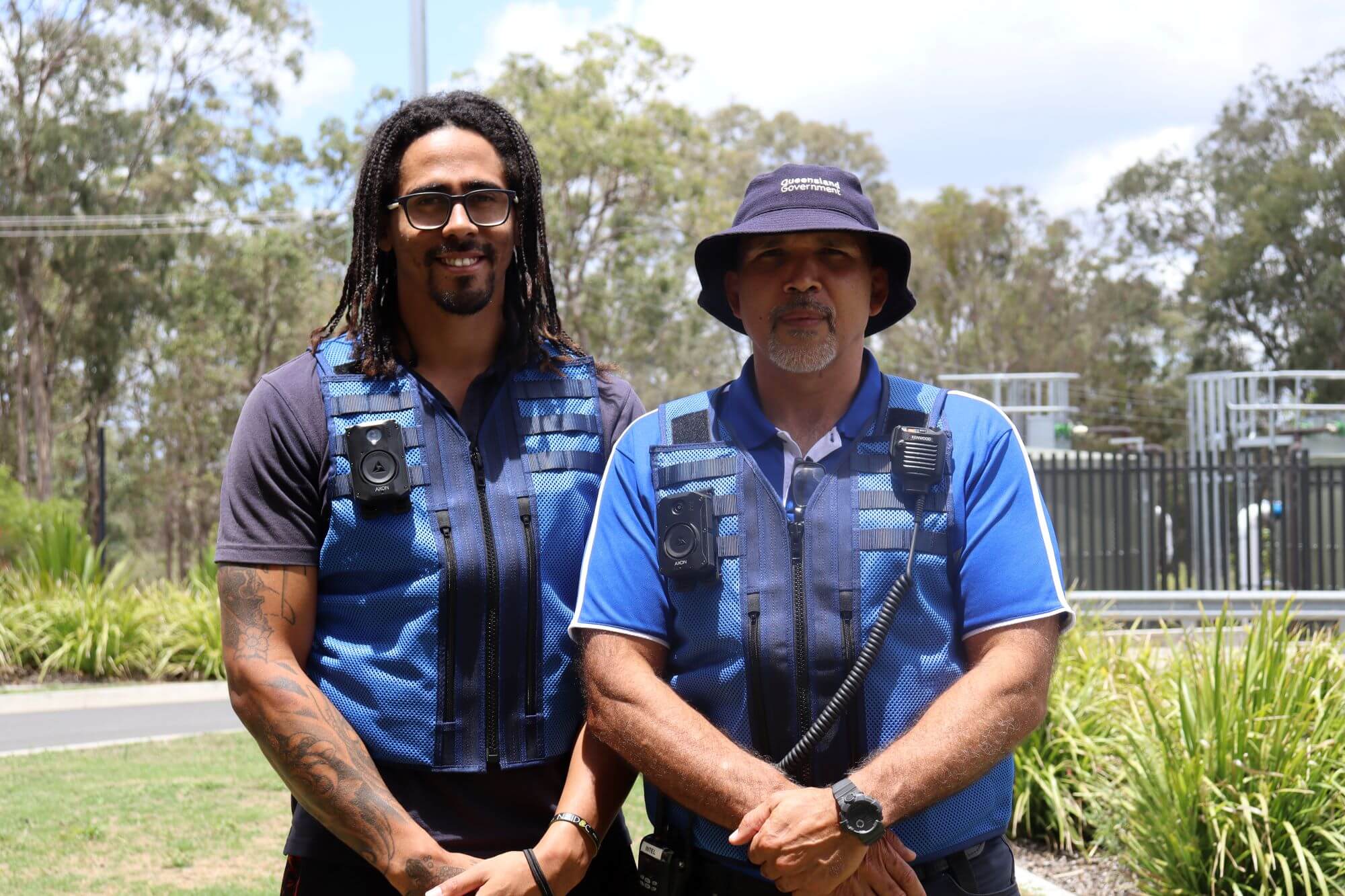 A youth detention worker\'s uniform includes a special vest to attach a body worn camera and radio to, a belt to secure keys to and enclosed shoes.