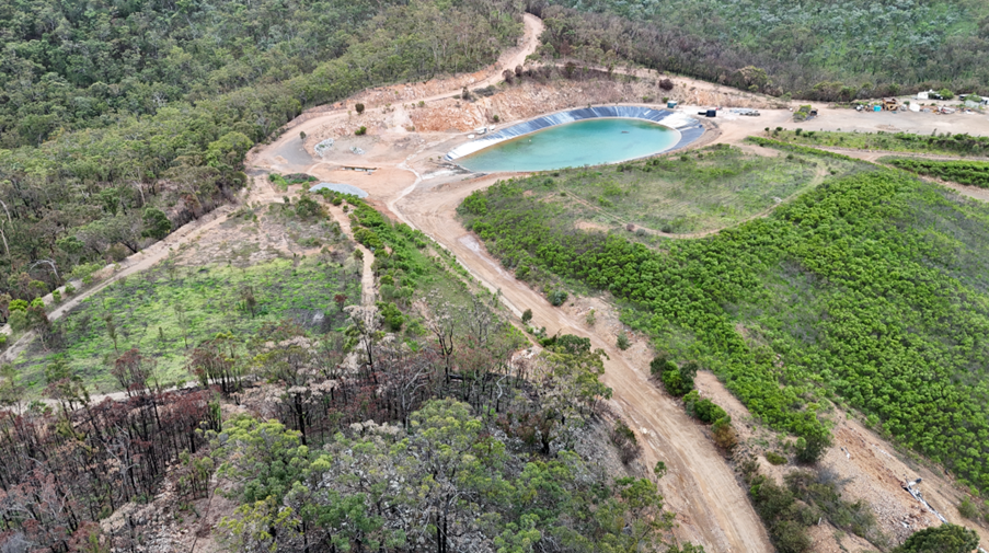 Revegetated remediation areas including waste rock dump