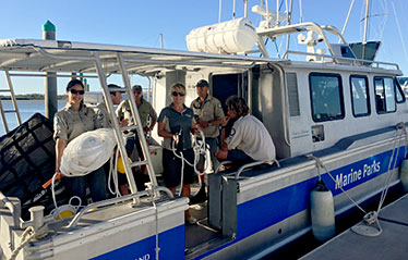 Image of QPWS marine park vessel, CH Thompson, heading out to Wolf Rock for range testing of equipment.