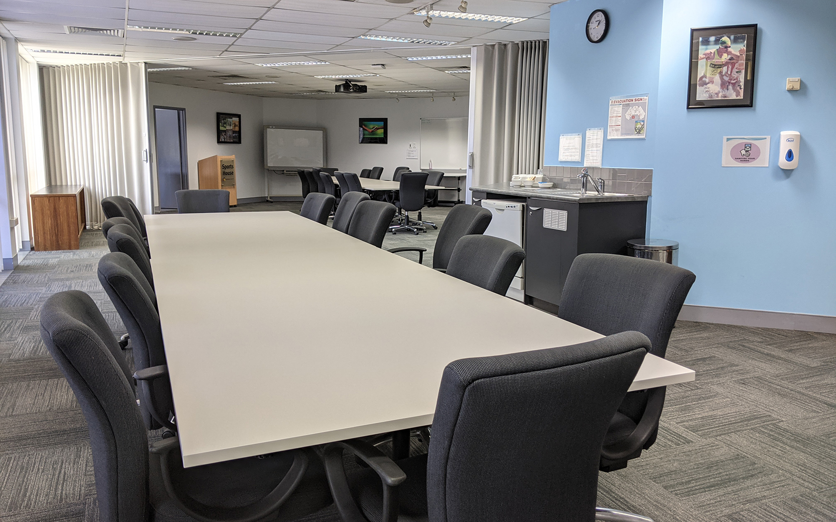Internal meeting room with table and chairs.