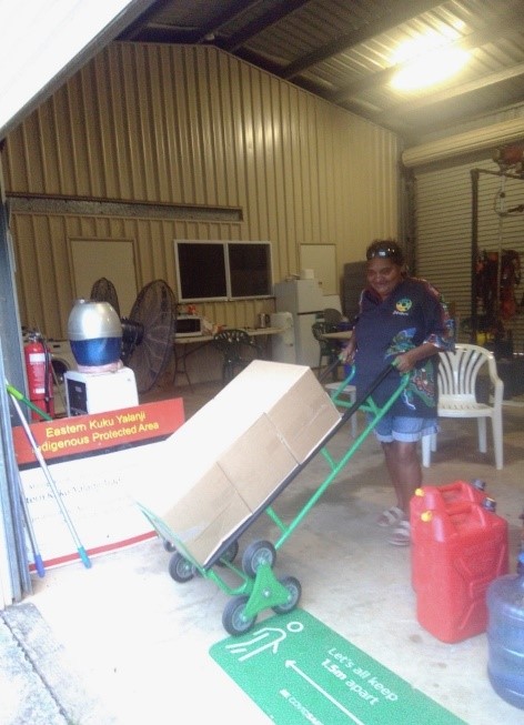 Rangers in work safe clothing preparing for cleanup