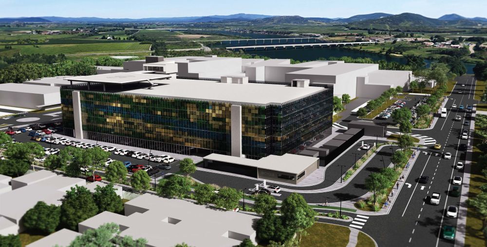 Artist&rsquo;s impression of the new-look Mackay Base Hospital with the huge multi-storey car park. Image courtesy of Health Infrastructure Queensland
