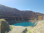 View of the water-filled open-cut pit at Mary Kathleen uranium mine