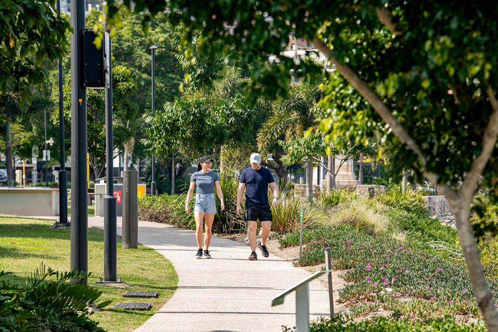 Concrete footpaths are primarily used for people walking. Personal mobility devices and e-bikes can also use these footpaths, but must stay below 12km/h and give way to people walking