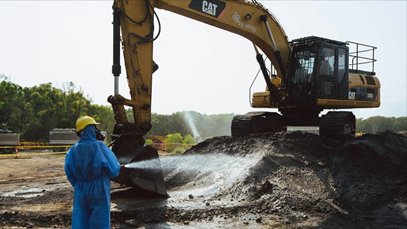 Workers undertaking asbestos remediation works