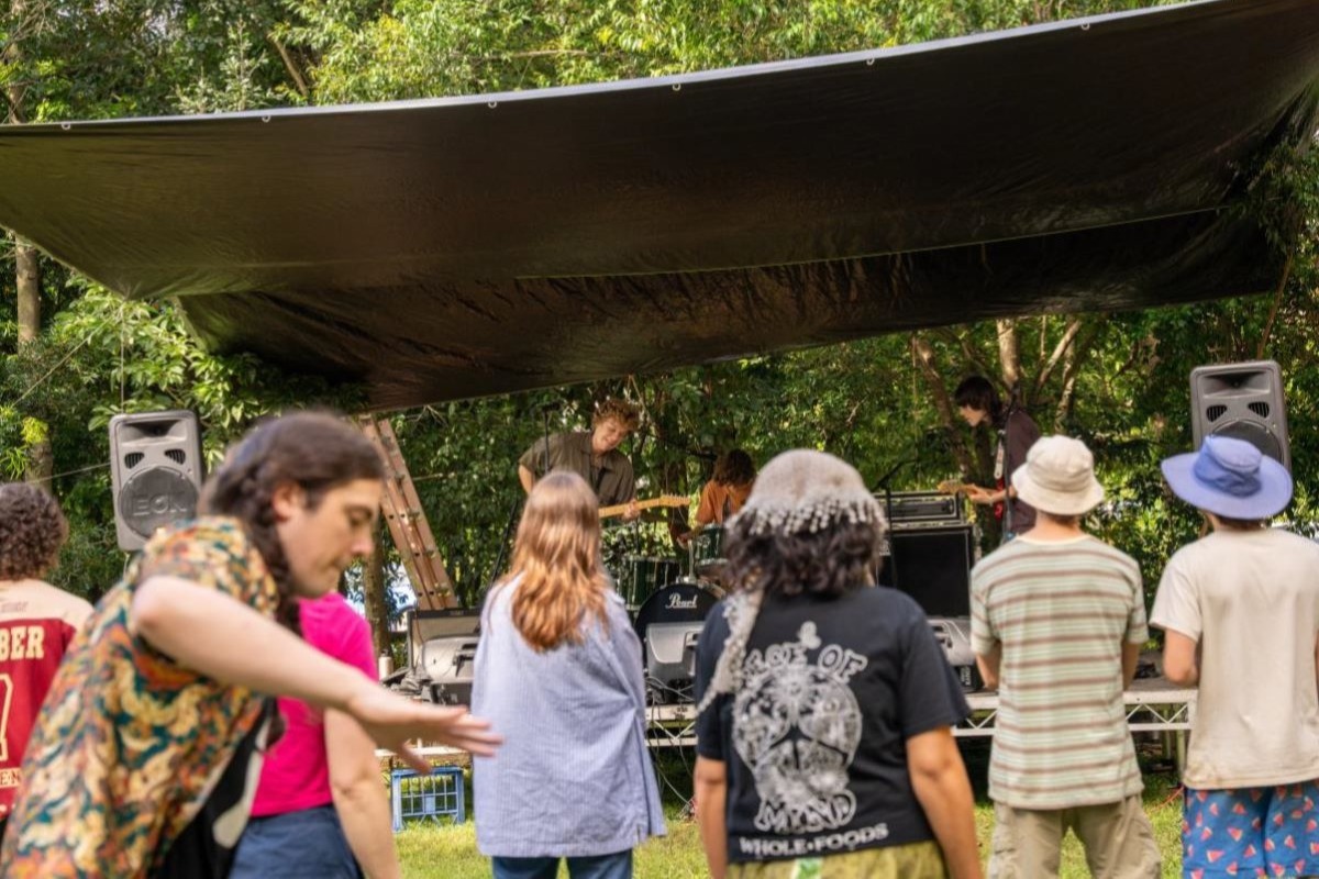 Young event goers enjoying music at Northey Street City Farm’s Youth Fest.